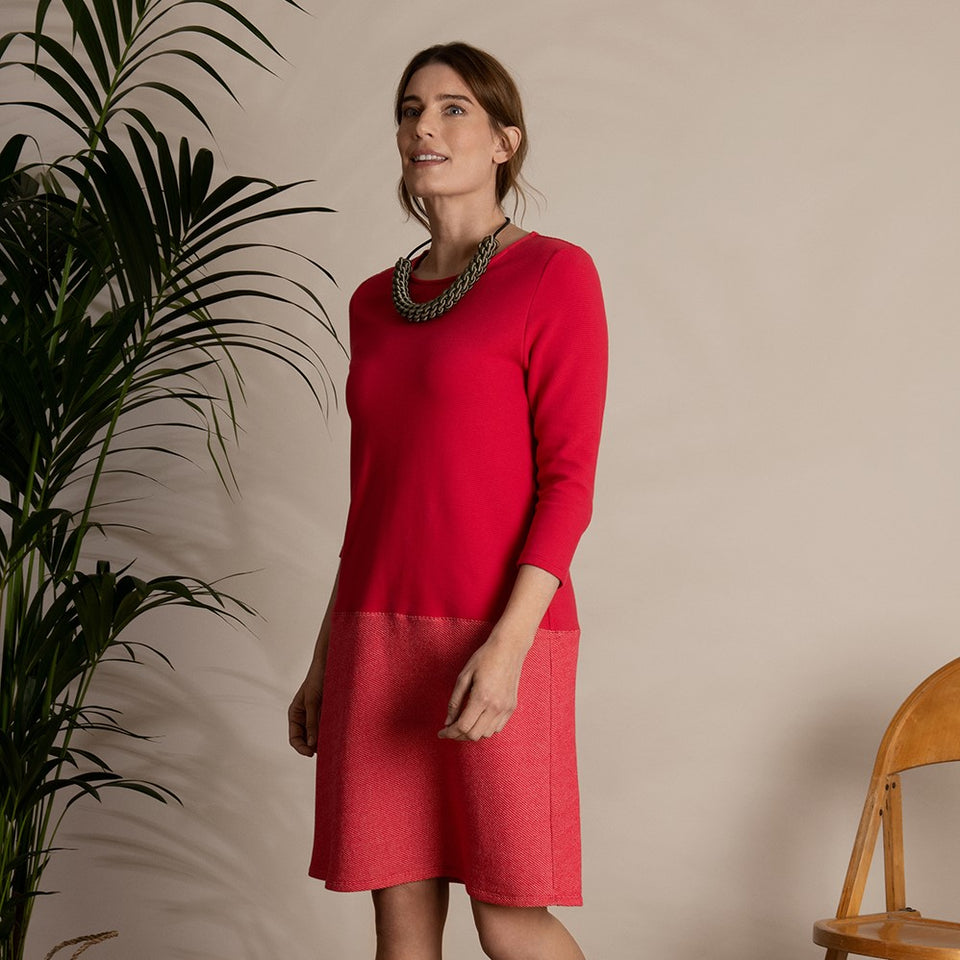 Model wearing red cotton jersey dress