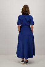 Load image into Gallery viewer, Model-wearing-Blue-wrap-dress-maxi-back-sneakers