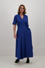 Load image into Gallery viewer, Model-wearing-Blue-wrap-dress-maxi-front-sneakers