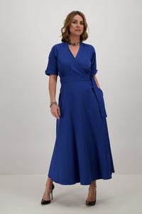 Model-wearing-Blue-wrap-dress-maxi-front-heels